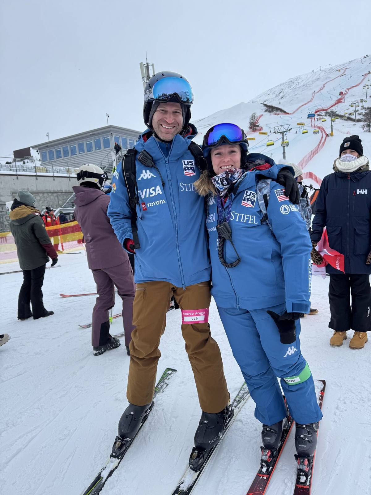 Dr. Goldwaser in U.S. Ski and Snowboard gear with an athlete at a World Cup course